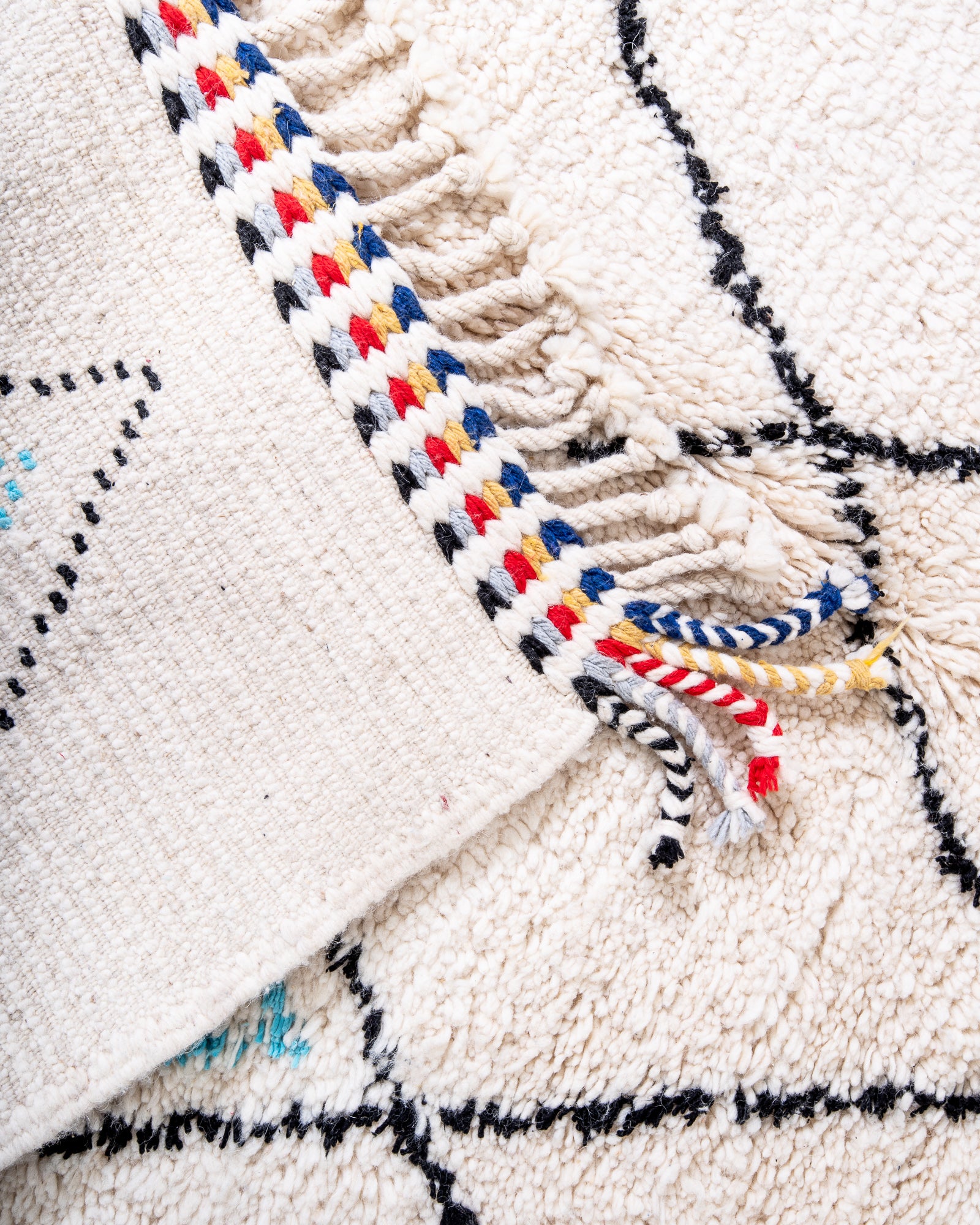 Modern, designer, handcrafted Berber rug from Morocco. Beniourain carpet with beautiful colours and patterns and fluffy wool texture.
